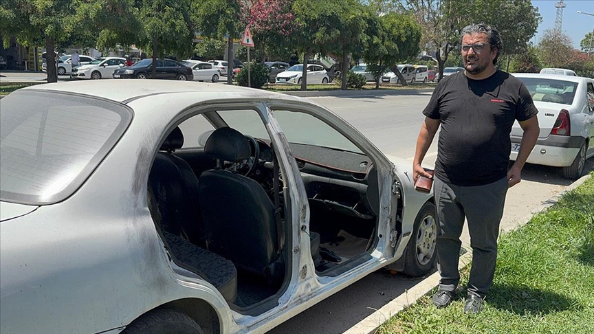 Park halindeki otomobilin kapılarını çalan zanlı tutuklandı
