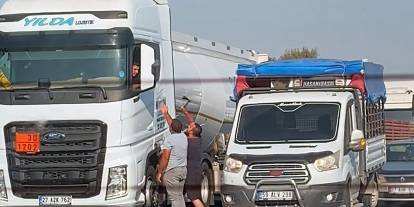 Tartıştığı TIR'ın sürücüsünü baltayla tehdit etti