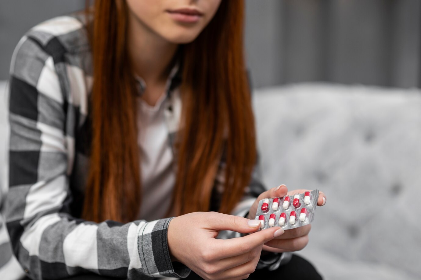 close-up-woman-holding-pills-23-2148369430.jpg