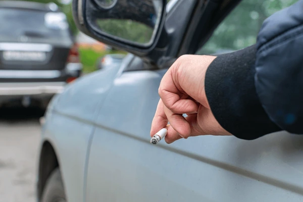 driver-stuck-out-his-hand-600nw-2182378689-001.webp